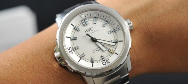 The white dial fake watch has a date window.