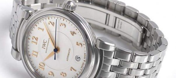 The stainless steel fake watch is designed for women.